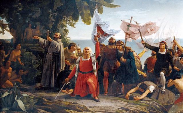 The first landing of Columbus in America / El primer desembarco de Colón en America (Dioscóo Puebla) [Public domain via Wikimedia]