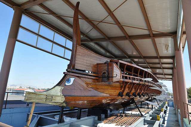 The Olympias, reconstruction of an ancient Athenian trireme. Note the ram on the bow. Photo by Yannis (2011) via Flickr [CC BY-NC-SA 2.0]